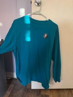 Long-Sleeve Teal Graphic Tee with Chest Emblem